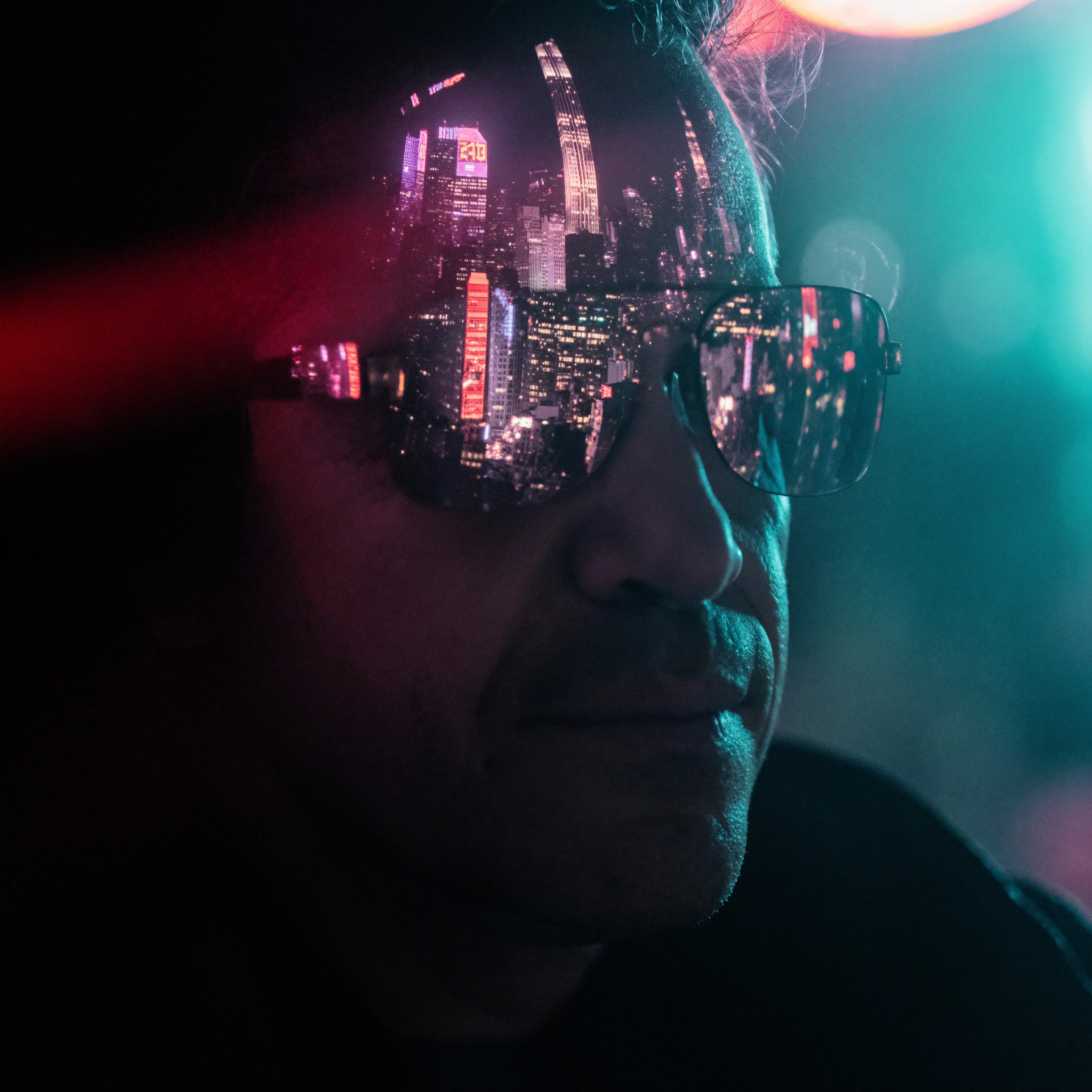 Manhattan cityscape reflected in Roberto Pereira Eisenlohr's sunglasses